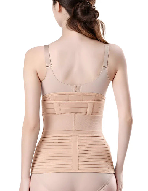 Back view of a woman wearing a beige postpartum C-section recovery belly wrap and a tummy support belt after childbirth.